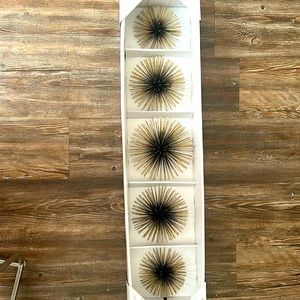 Gold and black wall decor